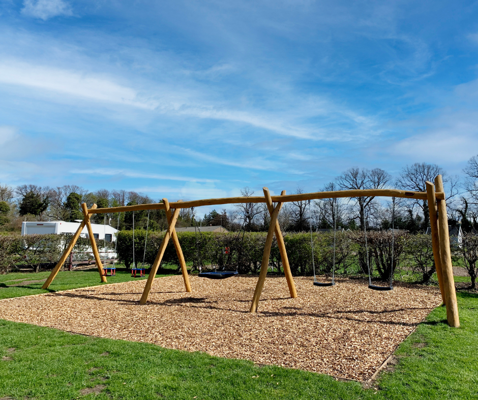 Picture of Children's Playground with swings and bark 